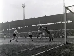Roy Sproson heads the ball clear with Ray Whittaker and Ian Buxton in close attendance