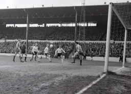 Ray Whittaker converges on the ball watched by Ian Buxton and Keith Allen. But the linesmans flag is up for offside