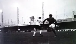 Brian Lewis attempts to block this clearance