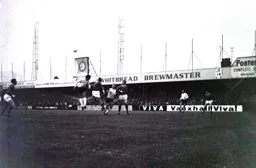 The ball is headed clear from Bruce Rioch and Laurie Sheffield