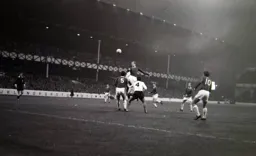 Sandy Brown gets above Alan Slough to head the ball away for Everton