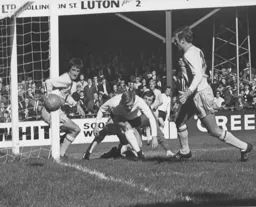 Brian Lewis sees his header go wide