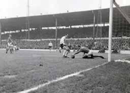 Gordon Morritt gets his hand to the ball to snatch it away from Laurie Sheffield