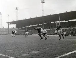 Northampton keeper Gordon Morritt gathers the ball as Laurie Sheffield closes in