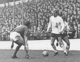 Brian Lewis taunts the Swindon defender