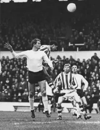 Terry Branston gets a header in