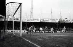 Brian Lewis fires the ball across the goalmouth