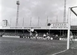 Mike Keen and Keith Allen go for the same ball