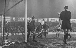 Terry Branston rises highest from a corner