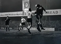 The referee has spotted a push by Laurie Sheffield