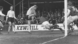 Brian Lewis scrambles in the Town's second goal