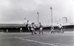 Mike Keen sends his header off target