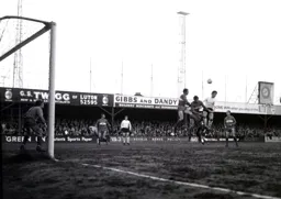 Bruce Rioch challenges for a high ball