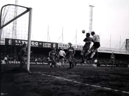 Ian Buxton wins an attacking header
