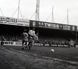 Graham French forces his way past Keith Eddy and Dunan Welbourne