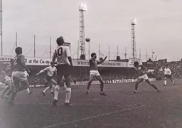 Keith Allen watches the cross come in