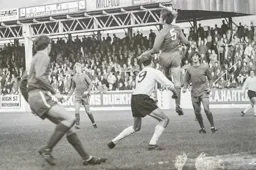 Matt Tees about to take the weight of the defender