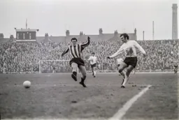 Graham French crossing across the box