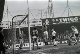 Keith Allen watches as the keeper punches clear