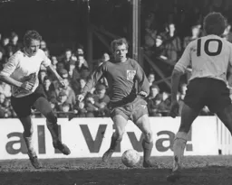 The Doncaster defender is surrounded