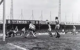 Chris Nicholl waits for the keeper to fumble the ball