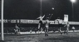 Matt Tees looks to punch the ball but the Rovers keeper beats him