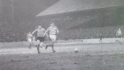 Malcolm Macdonald chases down the defender