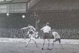 Malcolm Macdonald heads for goal