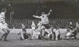 Malcolm Macdonald steps over the Reading defence