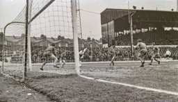 Malcolm Macdonald shoots at the far post