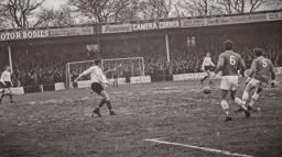 Mike Keen plays the ball across field