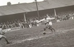 Malcolm Macdonald strikes for goal