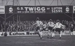 Malcolm Macdonald in an unfamiliar 7 shirt looks on