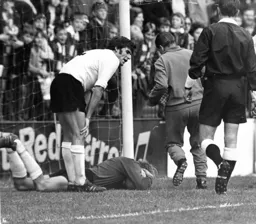 John Ryan looks on as his goalkeeper receives running repairs