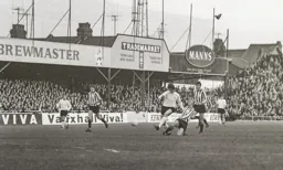 A last ditch tackle thwarts Don Givens