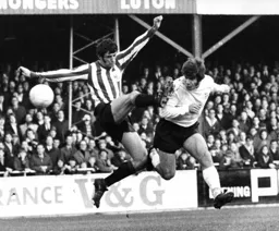 Malcolm Macdonald about to get clattered