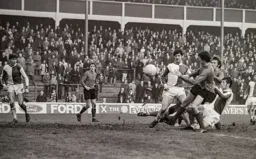 David Court and Jimmy Ryan in a goalmouth scramble
