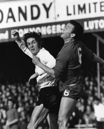 Don Givens battles with Watford's Tom Walley