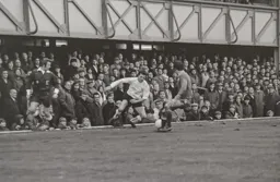 Jimmy Ryan takes his man on