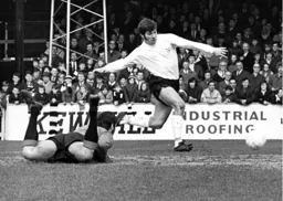 Malcolm Macdonald is through on goal