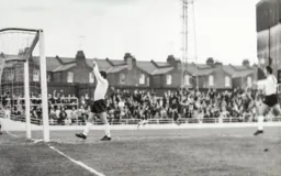 Malcolm Macdonald celebrates one of his three goals in his last game