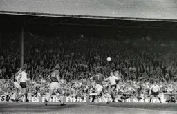 Chris Nicholl heads forward