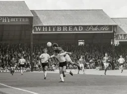 Peter Anderson feels the full force of a Preston defender