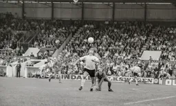 Viv Busby gets around Orient's Terry Mancini