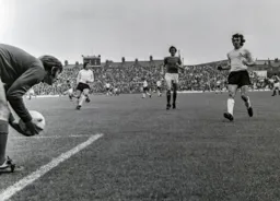 Peter Anderson pressures the Swindon keeper