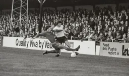 Peter Anderson is tackled by Orient's Peter Bennett