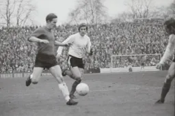 John Moore runs at the Fulham defence
