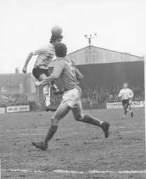 Viv Busby attempts to set up a Luton attack