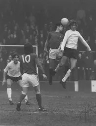 Robin Wainwright tries to head the ball on