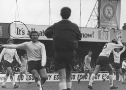David Court complains to the ref when the header from Chris Nicholl is ruled out
